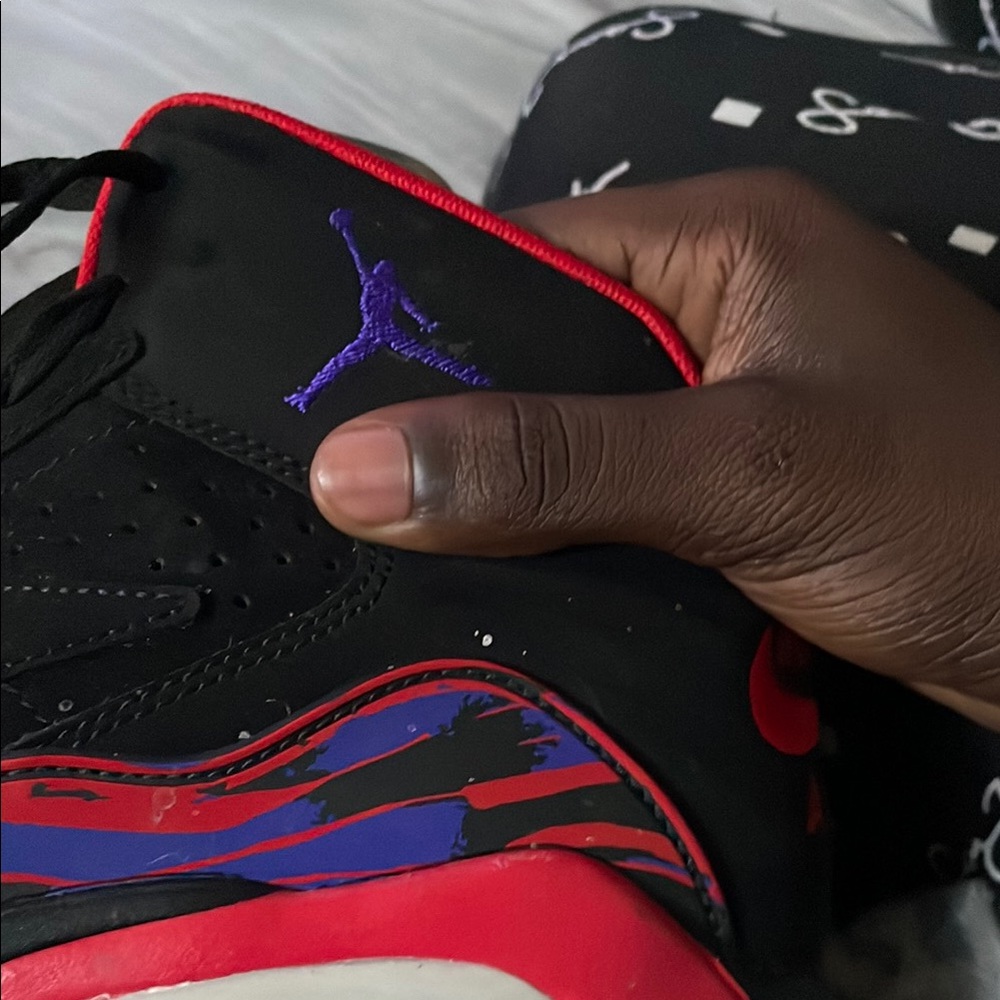 Black Jordan’s with Red and Purple Accents barely worn